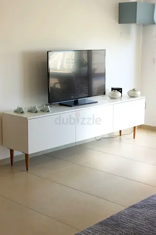 Modern White TV Stand with Wood Legs