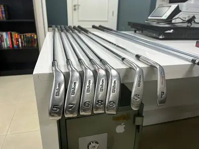 Wilson iron set (5-9) plus pitching and sand wedges - good condition