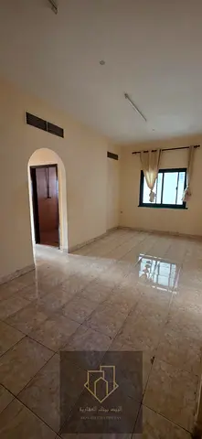 A spacious apartment on Ajman Corniche, featuring two bedrooms and a living room, one master bedroom, two bathrooms, a sea view, and a prime location close to services, restaurants, shops, and major r