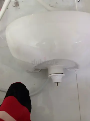 Wash basin with tab