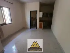 Studio for rent in Al Nuaimiya 2, second tenant, ground floor, semi-separate kitchen, central AC. AE