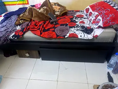 Bad and cupboard
