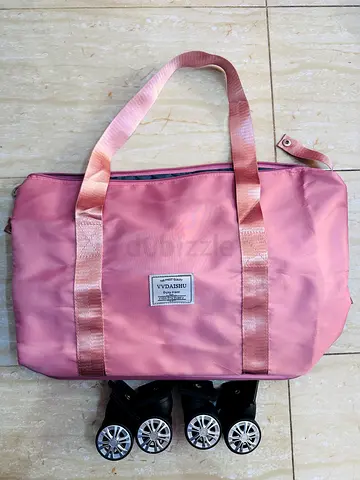 Hand-carry bag with wheels