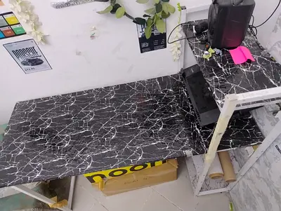 Black marble-effect desk/tabletop with metal frame - good condition