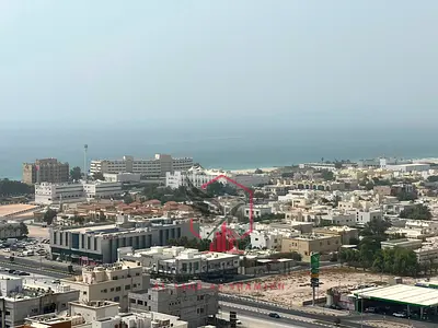 Beautiful two-bedroom apartment directly on Al Khan Corniche with sea-view balcony free parking built-in wardrobes and all bedrooms are master
