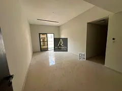 For annual rent - Al Nuaimiya 1 Two-bedroom apartment with a living room, built-in wardrobes, and th