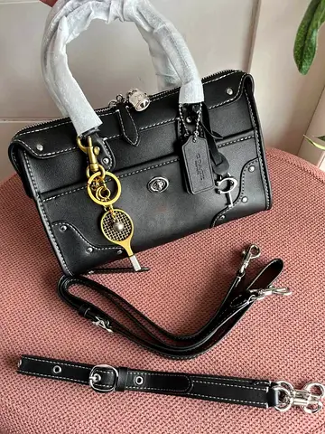 Black leather Coach satchel bag with detachable straps
