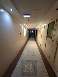 For rent in Al Khan Sharjah two bedroom apartment with living room two bathrooms central AC annual r