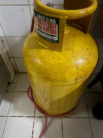 Yellow LPG Gas Cylinder with Hose - Used