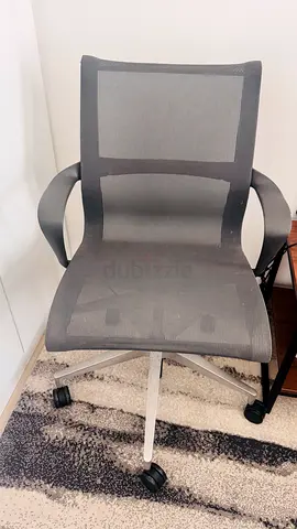 Grey Mesh Office Chair with Armrests and Wheels - average Condition but good for home office set up