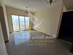 Two bedroom apartment and hall in Abu Shagara Sharjah balcony open view central AC free maintenance