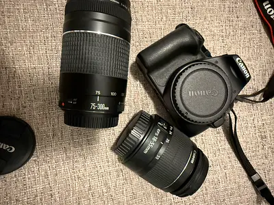 Canon EOS 250d DSLR body with 18-55mm and 75-300mm lenses - used