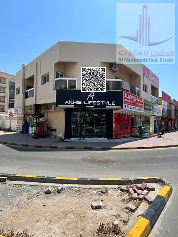 Building for sale in Al Nuaimiya 2, directly on Kuwait Street, situated on a corner plot.