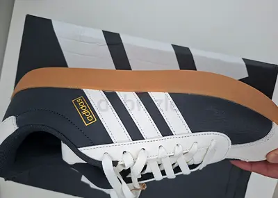Adidas casual sneakers with gum sole, size available