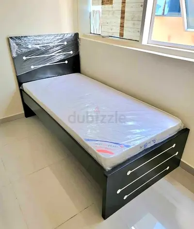 Single wooden bed with mattress - good condition