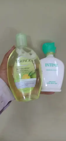 Lot of 2 personal care liquids — Skinox body wash & Intima feminine wash (used)