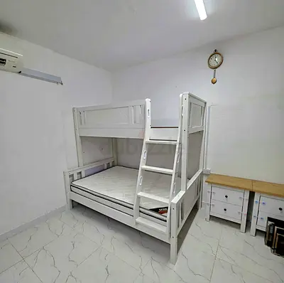 White wooden bunk bed with ladder - sturdy double over single without mattress