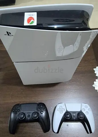 PlayStation 5 Console with Two DualSense Controllers (White & Black) - Working Condition