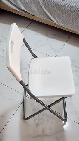 Foldable White Plastic & Metal Chair - Compact, Light Use