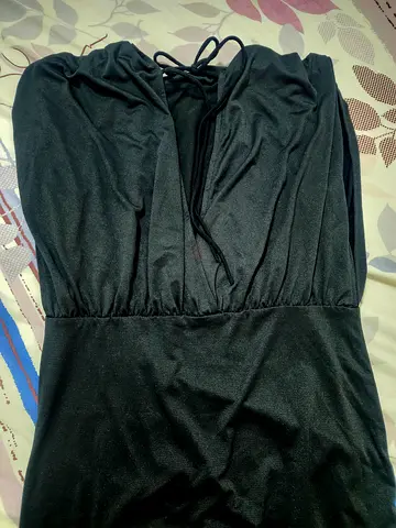 Black sleeveless V-neck women's dress/top, size not specified