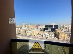 A distinctive studio apartment with a balcony is available for annual rent in Al Nuaimiya Tower C, f