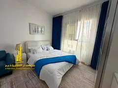 Super deluxe studio with separate kitchen and open view, furnished, for monthly rent in Ajman - Al J