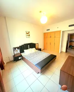 Furnished 1BHK Apartment in Oakwood Residency Near Meaisem city center