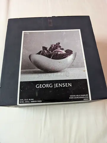 Georg Jensen Bloom Bowl, designed by Helle Damkjær, featuring a highly polished mirror finish.Usage: