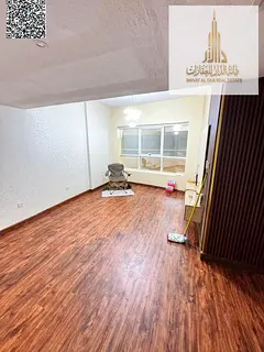 Two-bedroom apartment with a living room in Ajman, Al Hamidiya (Garden City Towers); includes parki