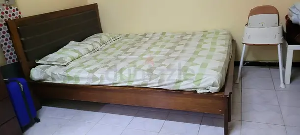 Solid wood double bed frame with headboard - good condition
