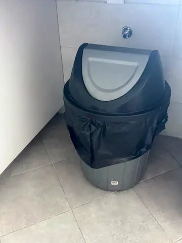 Used large swing-top kitchen/office trash bin