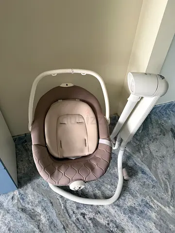 Used electric baby swing / rocker - beige/brown, good condition