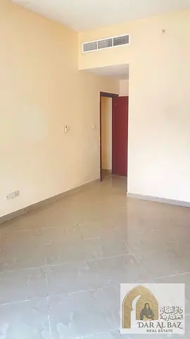 One of the finest apartments in Al Majaz 1: a master bedroom and a living room, at a special price.