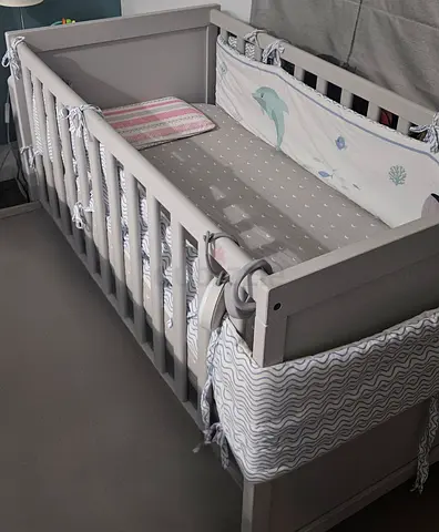 Solid wooden baby crib with bumper and matress - light grey