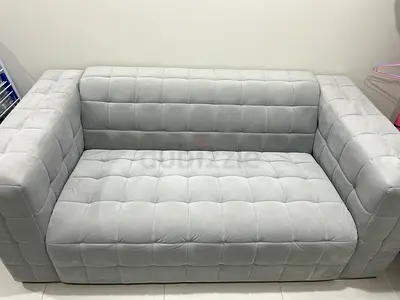 Light Grey 2-Seater Tufted Sofa - Good Condition