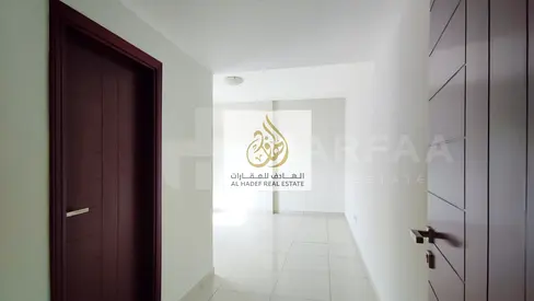 Two-bedroom apartment with a living room for annual rent in Al Nahda, Sharjah | Ready for immediate occupancy | One month free and free parking | Cont