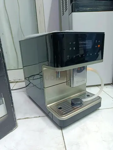 Miele CM 6360 Brand New MilkPerfection coffee machine features a metallic finish and an integrated
