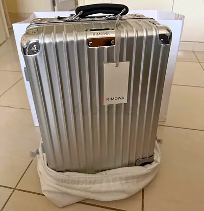Authentic Rimowa Classic Cabin Silver carry-on.