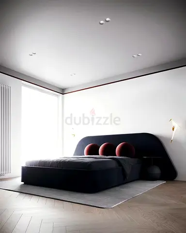 Modern low-profile upholstered double bed with curved headboard - dark grey