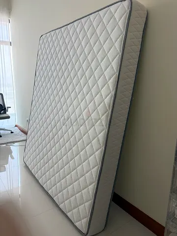 Queen-size mattress in good condition - water spots