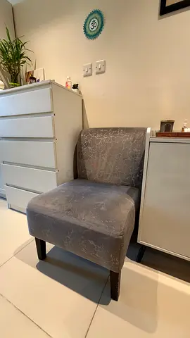 Compact grey upholstered accent chair - good condition