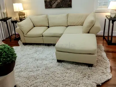 Expensive quality pottery barn modular sofa with ottoman