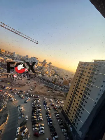 Two bedrooms and a living room for sale in Al Nuaimiya Tower C, Ajman, with a spacious area and a convenient payment plan.