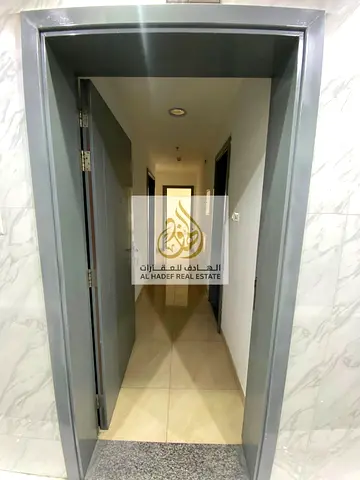 Spacious one-bedroom apartment with a living room in the Al Yasmeen area—first-time occupancy—at an