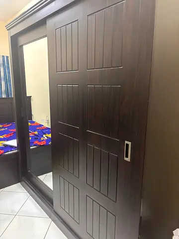 Sliding cupboard with full door mirror