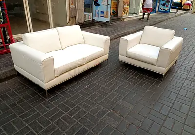 White leather 2-seater sofa + matching armchair - good condition