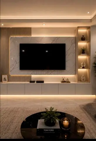 Modern built-in TV entertainment unit with marble feature and LED lighting