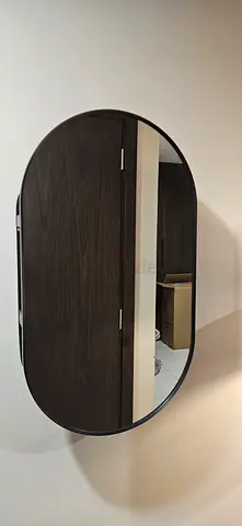 URGENT Sale _ Oval Wall-Mounted Mirror with Dark metal Frame - Good Condition