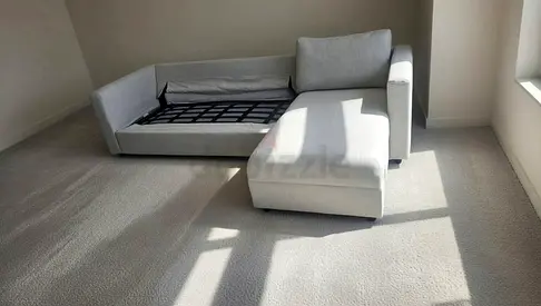 L-shaped chaise sofa (storage bed frame missing cushion)