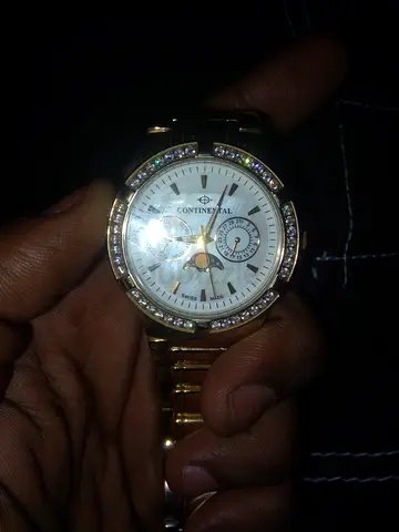 Continental gold-tone men's watch with crystal bezel, working condition